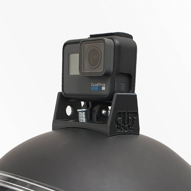 Image of the GoPro 8 Square one kiss cutaway mount on top of a black Kiss helmet